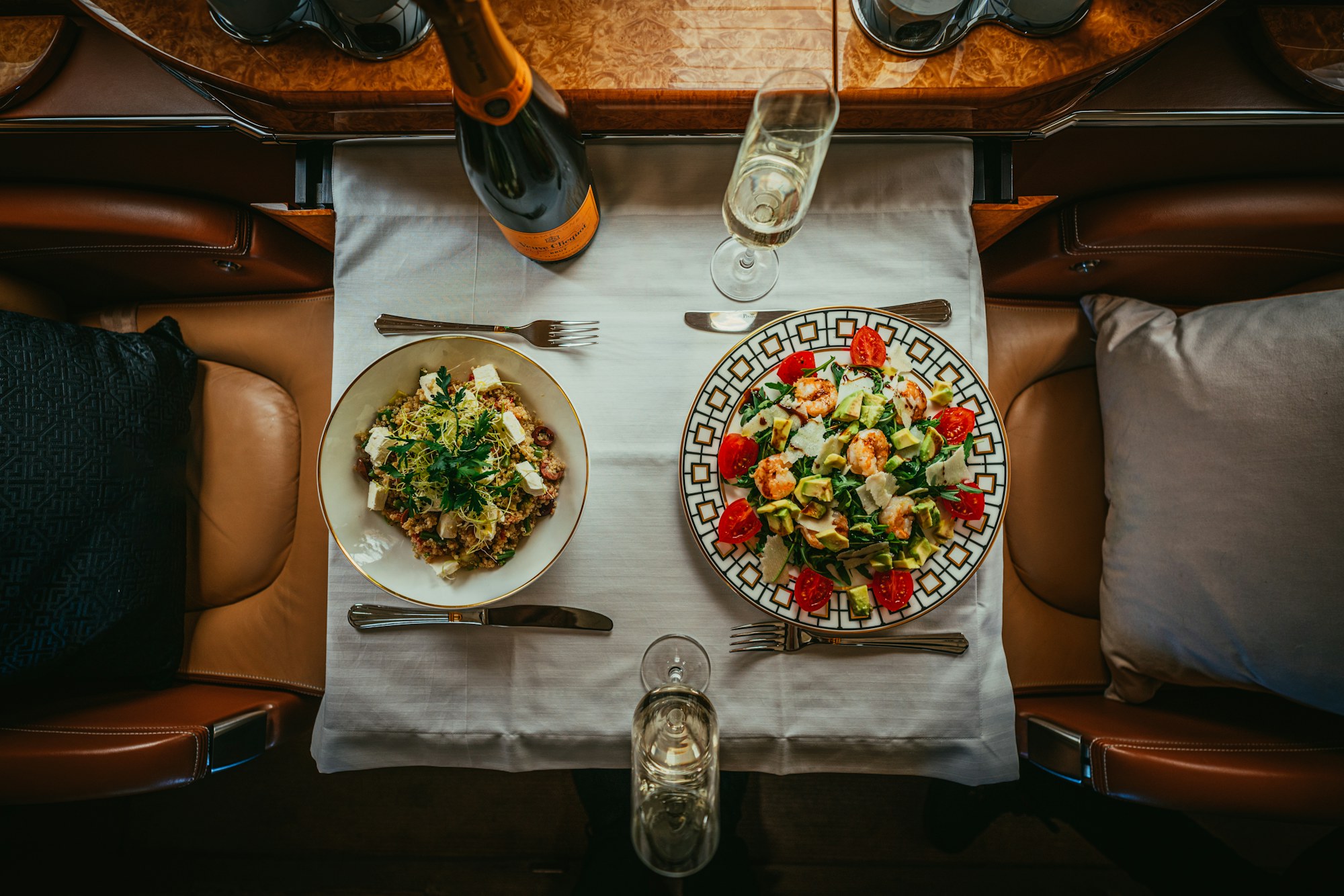 Dinner set for two in a private jet cabin